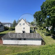2 Mehrfamilienhäuser auf großem Grundstück zum Verkauf